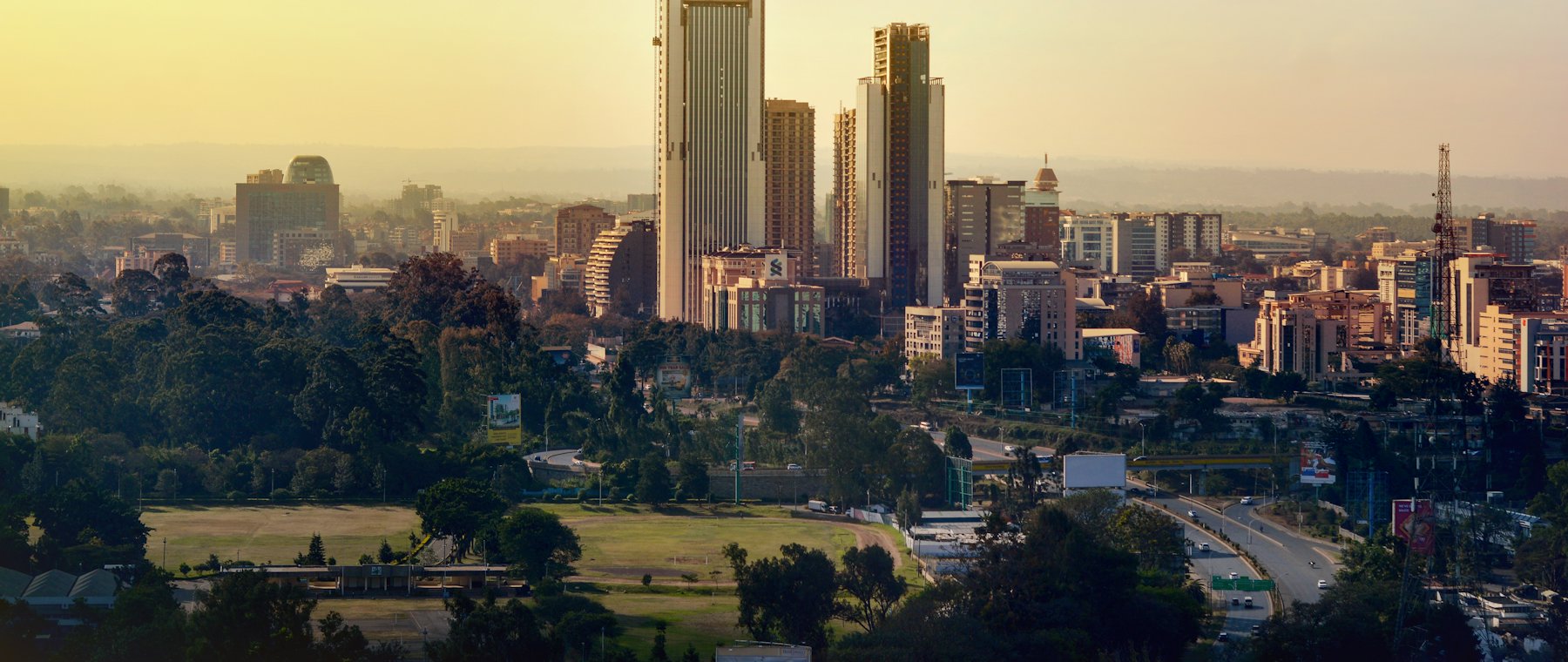 The Nairobi skyline under a pale sky