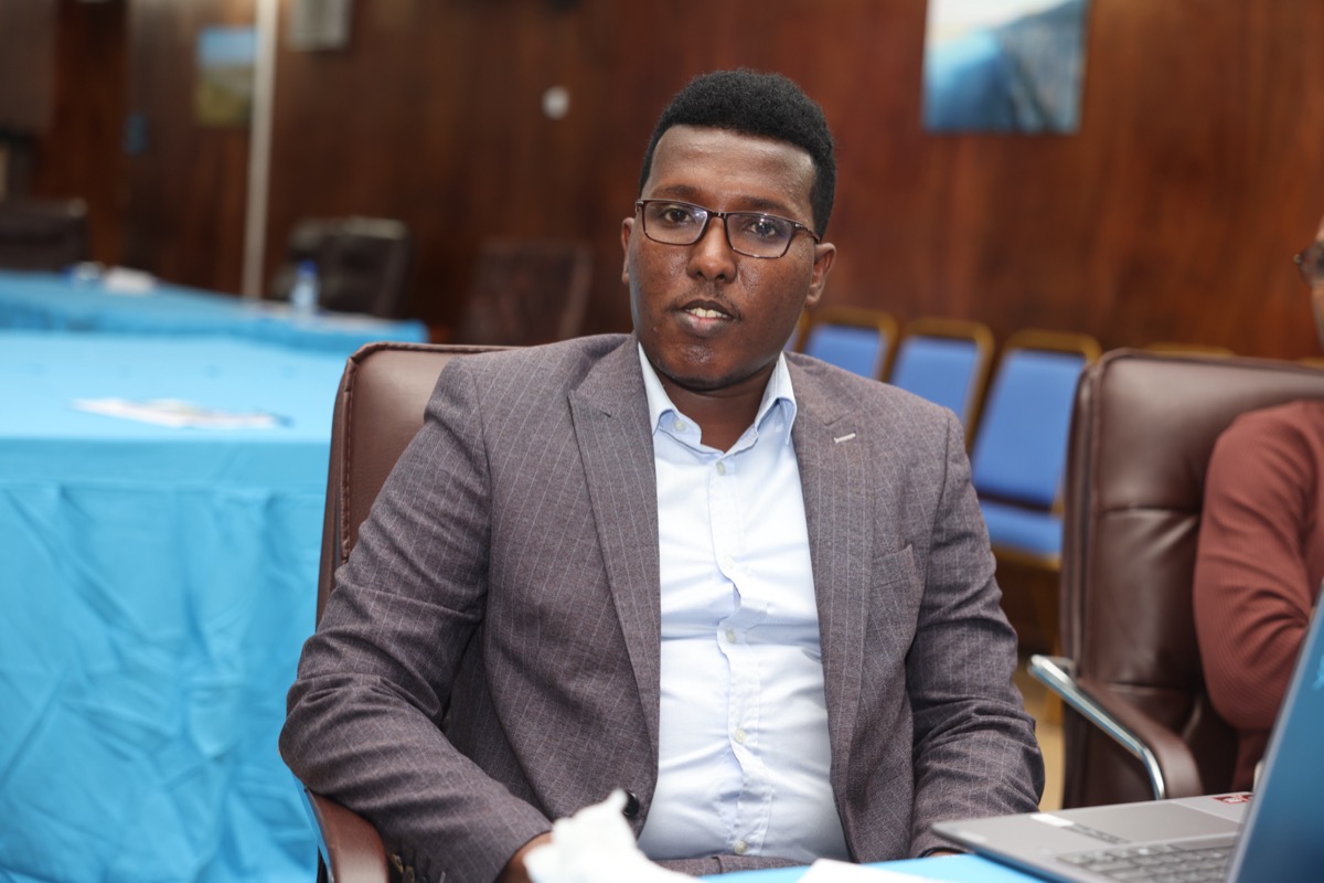 A participant at the table during the forum