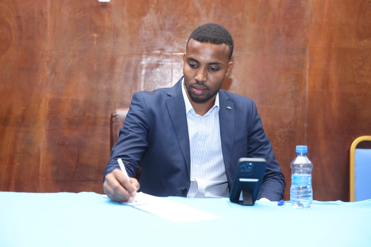 A participant working through the session papers