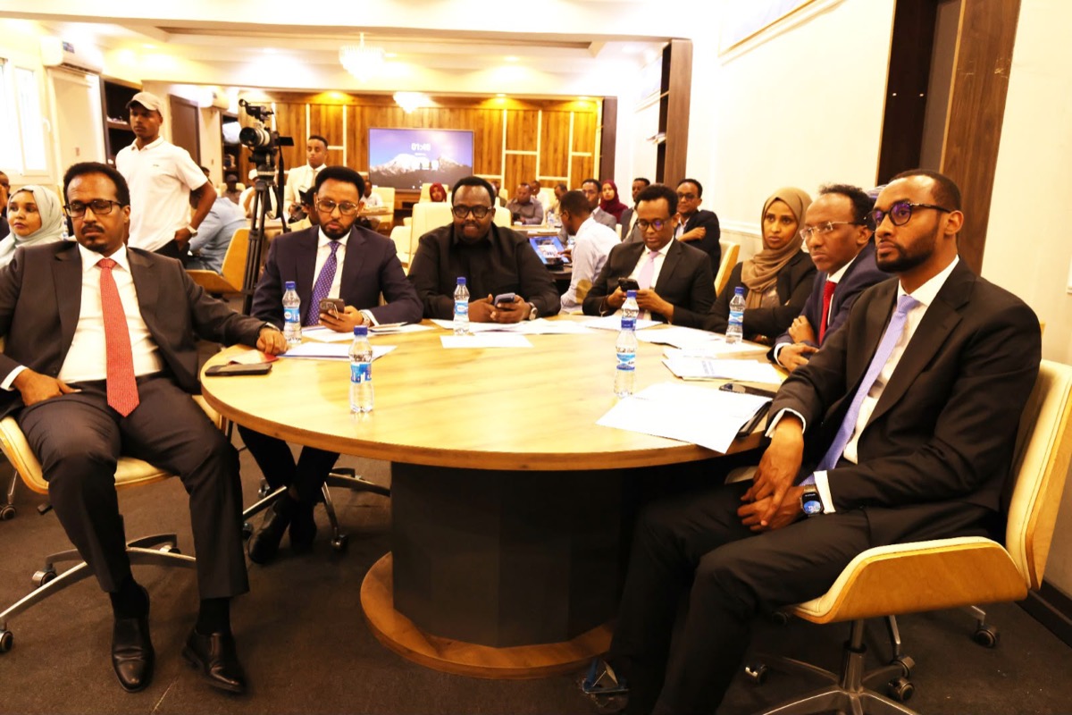 A working session in progress around one of the tables