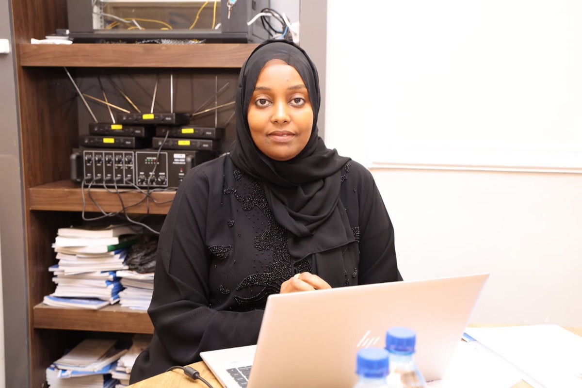 A member of the team working at the sound and recording desk